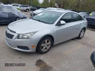 ✅ 2013 Chevrolet Cruze 1LT • VIN: 1G1PC5SB4D7324639 • Lot: 43594420. Listed on IAAI with 143,044 mi. Free auction sales archive from the USA and detailed vehicle history report at DreamBid. Image 2.