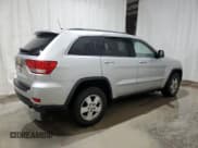 ✅ 2012 Jeep Grand Cherokee Laredo • VIN: 1C4RJFAG1CC120752 • Lot: 93726045. Listed on Copart with 207,479 mi. Free auction sales archive from the USA and detailed vehicle history report at DreamBid. Image 3.