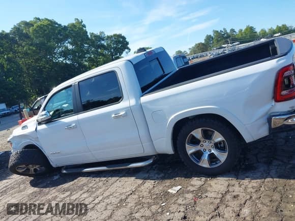 ✅ 2021 Ram 1500 Laramie • VIN: 1C6RREJT4MN630316 • Lot: 42844637. Listed on IAAI with 116,198 mi. Free auction sales archive from the USA and detailed vehicle history report at DreamBid. Image 14.