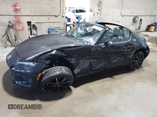 ✅ 2024 Mazda MX-5 Miata Grand Touring • VIN: JM1NDAM77R0600230 • Lot: 63307195. Listed on Copart with 6,299 mi. Free auction sales archive from the USA and detailed vehicle history report at DreamBid. Image 1.