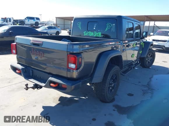 ✅ 2023 Jeep Gladiator Mojave • VIN: 1C6JJTEGXPL517914 • Lot: 43666074. Listed on IAAI with 33,445 mi. Free auction sales archive from the USA and detailed vehicle history report at DreamBid. Image 4.
