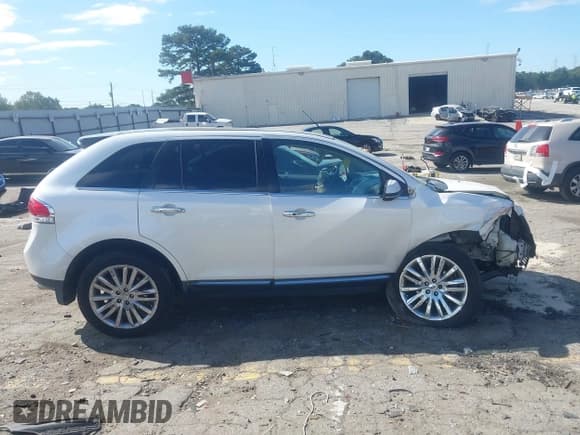 ✅ 2013 Lincoln MKX • VIN: 2LMDJ8JK2DBL23919 • Lot: 43427316. Listed on IAAI with 218,766 mi. Free auction sales archive from the USA and detailed vehicle history report at DreamBid. Image 13.