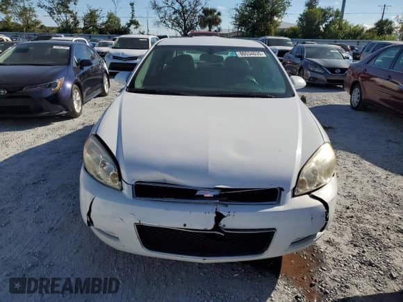 ✅ 2013 Chevrolet Impala LTZ • VIN: 2G1WC5E38D1215761 • Lot: 90534035. Listed on Copart with 205,467 mi. Free auction sales archive from the USA and detailed vehicle history report at DreamBid. Image 5.