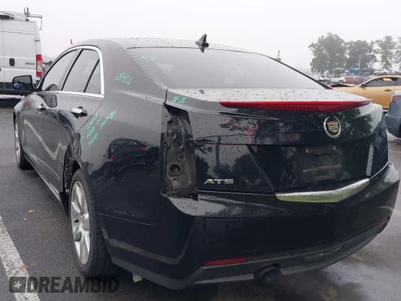 ✅ 2014 Cadillac ATS Standard RWD • VIN: 1G6AA5RA0E0106484 • Lot: 42496217. Listed on IAAI with 124,543 mi. Free auction sales archive from the USA and detailed vehicle history report at DreamBid. Image 3.