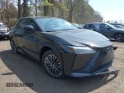 ✅ 2024 Lexus RZ 450e Premium • VIN: JTJAAAABXRA023751 • Lot: 42082320. Listed on IAAI with 15,641 mi. Free auction sales archive from the USA and detailed vehicle history report at DreamBid. Image 1.