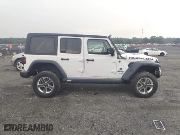 ✅ 2021 Jeep Wrangler Unlimited Rubicon • VIN: 1C4HJXFN1MW796739 • Лот: 42540683. Опубликован ранее на IAAI с пробегом 56 864 миль. Бесплатный доступ к архиву аукционных продаж из США и подробный отчёт об истории автомобиля на DreamBid. Изображение 13.