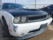 ✅ 2013 Dodge Challenger Rallye Redline • VIN: 2C3CDYAG6DH676633 • Lot: 40779561. Wystawiony na IAAI z przebiegiem 167 051 mil. Bezpłatny archiwum sprzedaży aukcyjnych z USA i szczegółowy raport historii pojazdu na DreamBid. Zdjęcie 6.