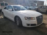 ✅ 2015 Audi A8 4.0T • VIN: WAUJ2AFD3FN005524 • Лот: 65610982. Опубликован ранее на Copart с пробегом 105 627 миль. Бесплатный доступ к архиву аукционных продаж из США и подробный отчёт об истории автомобиля на DreamBid. Изображение 1.