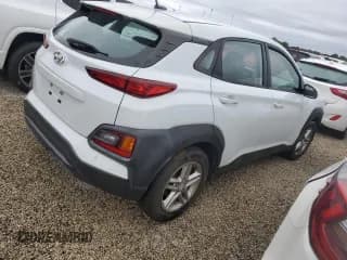 ✅ 2019 Hyundai Kona SE • VIN: KM8K12AA9KU236033 • Лот: 73751754. Опубликован ранее на Copart с пробегом 61 728 миль. Бесплатный доступ к архиву аукционных продаж из США и подробный отчёт об истории автомобиля на DreamBid. Изображение 3.