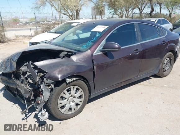 ✅ 2009 Mazda 6 S Grand Touring • VIN: 1YVHP82B695M09612 • Lot: 42537398. Listed on IAAI with 168,931 mi. Free auction sales archive from the USA and detailed vehicle history report at DreamBid. Image 2.