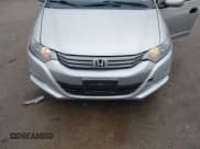 ✅ 2010 Honda Insight LX • VIN: JHMZE2H54AS029462 • Lot: 43806001. Listed on IAAI with 121,625 mi. Free auction sales archive from the USA and detailed vehicle history report at DreamBid. Image 6.