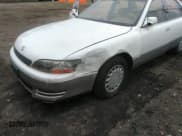 ✅ 1996 Lexus ES 300 • VIN: JT8BF12G6T0135462 • Lot: 36156597. Wystawiony na IAAI z przebiegiem 212 845 mil. Bezpłatny archiwum sprzedaży aukcyjnych z USA i szczegółowy raport historii pojazdu na DreamBid. Zdjęcie 6.