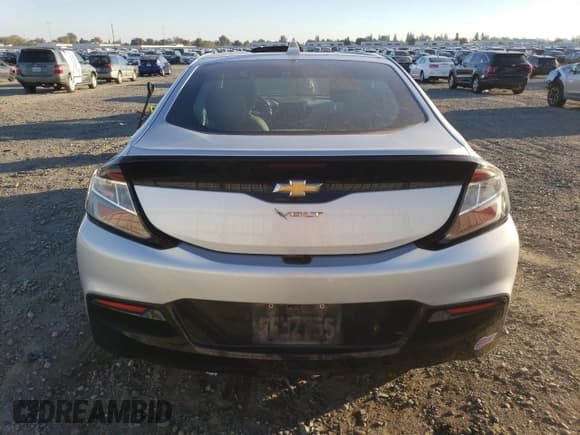 ✅ 2018 Chevrolet Volt LT • VIN: 1G1RC6S56JU136663 • Лот: 90763475. Опубликован ранее на Copart с пробегом 95 543 миль. Бесплатный доступ к архиву аукционных продаж из США и подробный отчёт об истории автомобиля на DreamBid. Изображение 6.