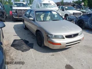 ✅ 1996 Nissan Maxima GXE • VIN: JN1CA21D4TM409657 • Лот: 42434635. Опубликован ранее на IAAI с пробегом 123 955 миль. Бесплатный доступ к архиву аукционных продаж из США и подробный отчёт об истории автомобиля на DreamBid. Изображение 1.