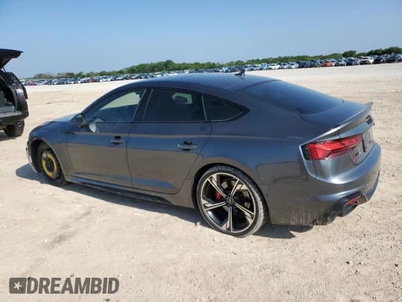 ✅ 2022 Audi RS 5 Sportback • VIN: WUAAWCF51NA900739 • Lot: 55451595. Listed on Copart with 88,652 mi. Free auction sales archive from the USA and detailed vehicle history report at DreamBid. Image 2.