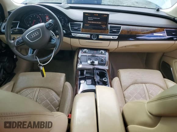 ✅ 2016 Audi A8 Sport • VIN: WAU43AFD2GN014467 • Лот: 87472755. Опубликован ранее на Copart с пробегом 101 368 миль. Бесплатный доступ к архиву аукционных продаж из США и подробный отчёт об истории автомобиля на DreamBid. Изображение 8.