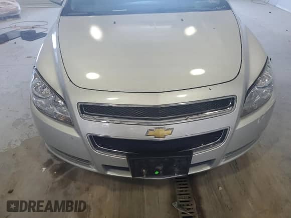 2012 Chevrolet Malibu 2LT z VIN 1G1ZD5E07CF330472, wystawiony jako Copart lot #69040254 z przebiegiem 136 393 mil mil oraz Szkoda całkowita • Salvage title. Historia ofert i sprzedaży dostępna na DreamBid. Obrazek 12.