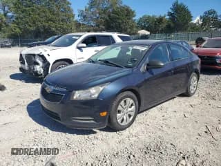 ✅ 2014 Chevrolet Cruze LS • VIN: 1G1PA5SG0E7478221 • Lot: 84741845. Listed on Copart with 999,998 mi. Free auction sales archive from the USA and detailed vehicle history report at DreamBid. Image 1.