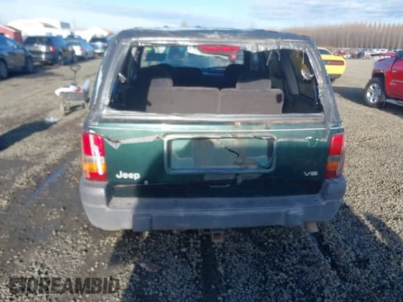 ✅ 1996 Jeep Grand Cherokee Laredo • VIN: 1J4GZ58Y4TC282507 • Lot: 43821297. Wystawiony na IAAI z przebiegiem 240 772 mil. Bezpłatny archiwum sprzedaży aukcyjnych z USA i szczegółowy raport historii pojazdu na DreamBid. Zdjęcie 6.