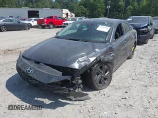 ✅ 2021 Hyundai Elantra SEL • VIN: 5NPLM4AG2MH002104 • Lot: 42785596. Listed on IAAI with 57,196 mi. Free auction sales archive from the USA and detailed vehicle history report at DreamBid. Image 2.