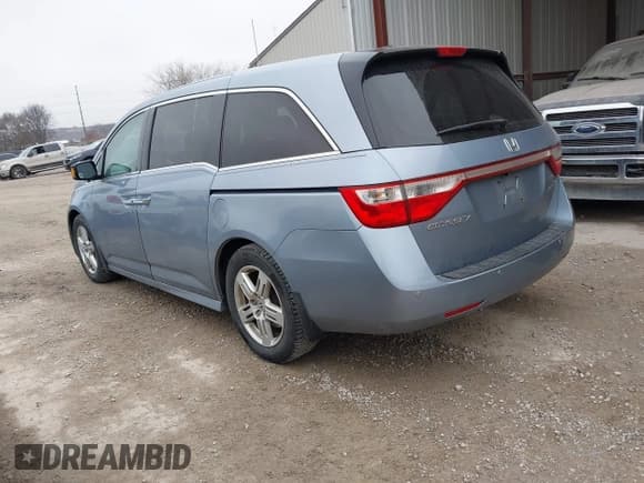 ✅ 2011 Honda Odyssey Touring • VIN: 5FNRL5H90BB060864 • Lot: 43756563. Listed on IAAI with 183,992 mi. Free auction sales archive from the USA and detailed vehicle history report at DreamBid. Image 3.