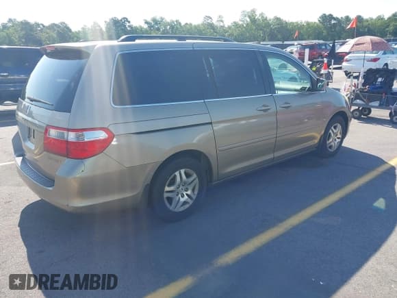 ✅ 2005 Honda Odyssey EX-L • VIN: 5FNRL38735B111376 • Lot: 42378824. Listed on IAAI with 191,632 mi. Free auction sales archive from the USA and detailed vehicle history report at DreamBid. Image 4.