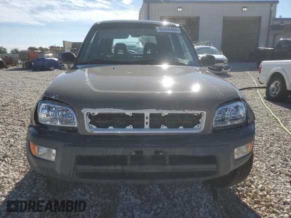 ✅ 1998 Toyota RAV4 • VIN: JT3HP10V0W7102211 • Lot: 66868464. Wystawiony na Copart z przebiegiem 214 038 mil. Bezpłatny archiwum sprzedaży aukcyjnych z USA i szczegółowy raport historii pojazdu na DreamBid. Zdjęcie 5.