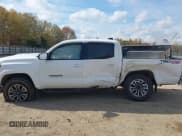 ✅ 2020 Toyota Tacoma TRD Off Road • VIN: 3TMCZ5ANXLM325654 • Lot: 43637670. Listed on IAAI with 137,509 mi. Free auction sales archive from the USA and detailed vehicle history report at DreamBid. Image 14.