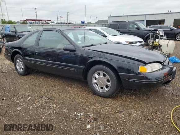 ✅ 1997 Ford Thunderbird LX • VIN: 1FALP62W0VH157636 • Lot: 57436535. Wystawiony na Copart z przebiegiem 120 433 mil. Bezpłatny archiwum sprzedaży aukcyjnych z USA i szczegółowy raport historii pojazdu na DreamBid. Zdjęcie 4.