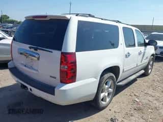 2011 Chevrolet Suburban LT z VIN 1GNSCJE02BR187519, wystawiony jako IAAI lot #43136755 z przebiegiem 203 141 mil mil oraz . Historia ofert i sprzedaży dostępna na DreamBid. Obrazek 4.