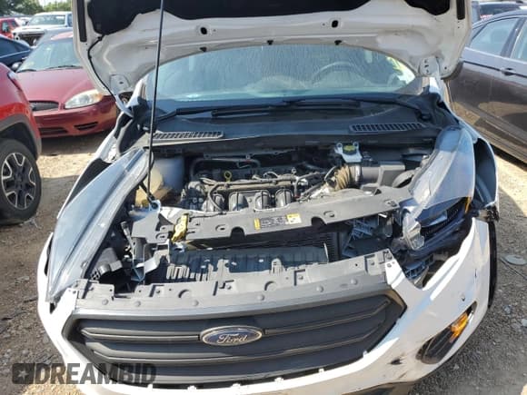 ✅ 2018 Ford Escape S • VIN: 1FMCU0F79JUC07742 • Лот: 67199553. Опубликован ранее на Copart с пробегом 102 494 миль. Бесплатный доступ к архиву аукционных продаж из США и подробный отчёт об истории автомобиля на DreamBid. Изображение 12.