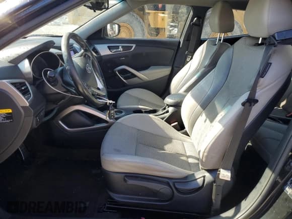 ✅ 2013 Hyundai Veloster w/Gray Int • VIN: KMHTC6ADXDU171485 • Lot: 76524434. Wystawiony na Copart z przebiegiem 165 476 mil. Bezpłatny archiwum sprzedaży aukcyjnych z USA i szczegółowy raport historii pojazdu na DreamBid. Zdjęcie 7.