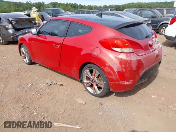 2013 Hyundai Veloster w/Black Int с VIN KMHTC6AD3DU099707, выставлен на аукционе IAAI как лот 43076379 с пробегом 128 517 миль миль и . История ставок и продаж доступна на DreamBid. Изображение 3.