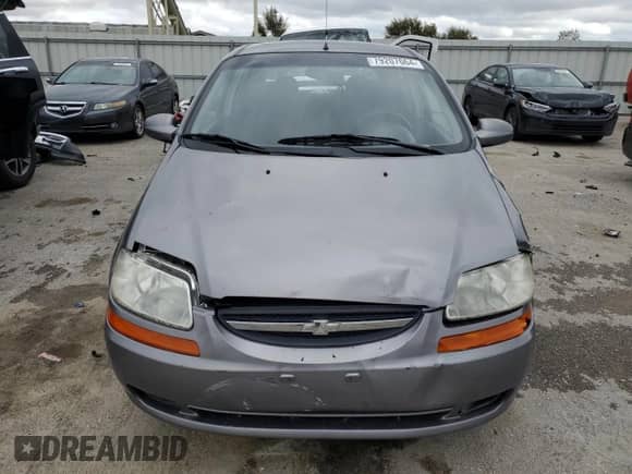 2006 Chevrolet Aveo LS with VIN KL1TD66666B674044, listed as a Copart auction lot 79207664 with 149,042 mi miles and Salvage title. Bid and sale history available at DreamBid. Image 5.