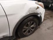 ✅ 2014 Hyundai Santa Fe • VIN: 5XYZU3LB9EG218191 • Лот: 43693585. Опубликован ранее на IAAI с пробегом 169 699 миль. Бесплатный доступ к архиву аукционных продаж из США и подробный отчёт об истории автомобиля на DreamBid. Изображение 6.