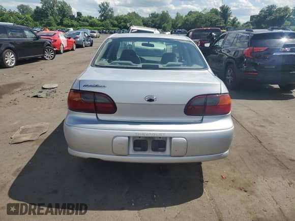 2003 Chevrolet Malibu with VIN 1G1ND52JX3M556142, listed as a Copart auction lot 56645164 with 190,649 mi miles and Salvage title. Bid and sale history available at DreamBid. Image 6.