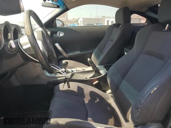 ✅ 2003 Nissan 350Z Touring • VIN: JN1AZ34D63T113370 • Лот: 82079285. Опубликован ранее на Copart с пробегом Не указан. Бесплатный доступ к архиву аукционных продаж из США и подробный отчёт об истории автомобиля на DreamBid. Изображение 7.