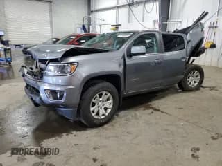 ✅ 2020 Chevrolet Colorado 4WD LT • VIN: 1GCGTCEN1L1220192 • Лот: 64966685. Опубликован ранее на Copart с пробегом 76 969 миль. Бесплатный доступ к архиву аукционных продаж из США и подробный отчёт об истории автомобиля на DreamBid. Изображение 1.