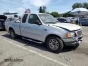 ✅ 2001 Ford F-150 XL • VIN: 1FTRX17L71KA17165 • Lot: 57982675. Listed on Copart with Not provided. Free auction sales archive from the USA and detailed vehicle history report at DreamBid. Image 4.