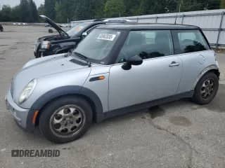 2003 MINI Hardtop with VIN WMWRC33403TC43230, listed as a Copart auction lot 68962035 with 133,325 mi miles and Salvage title. Bid and sale history available at DreamBid. Image 1.