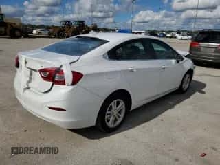 2018 Chevrolet Cruze LT z VIN 1G1BE5SM0J7246944, wystawiony jako Copart lot #70740502 z przebiegiem 73 133 mil mil oraz . Historia ofert i sprzedaży dostępna na DreamBid. Obrazek 3.