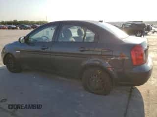 2011 Hyundai Accent GLS z VIN KMHCN4AC8BU620097, wystawiony jako Copart lot #70177664 z przebiegiem 245 022 mil mil oraz Szkoda całkowita • Salvage title. Historia ofert i sprzedaży dostępna na DreamBid. Obrazek 2.