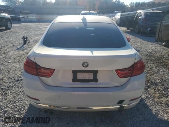 ✅ 2015 BMW 4 Series 428i • VIN: WBA4A9C51FGL85088 • Лот: 91577935. Опубликован ранее на Copart с пробегом 215 009 миль. Бесплатный доступ к архиву аукционных продаж из США и подробный отчёт об истории автомобиля на DreamBid. Изображение 6.
