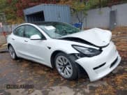 ✅ 2021 Tesla Model 3 Standard Range Plus • VIN: 5YJ3E1EAXMF020558 • Lot: 43559203. Wystawiony na IAAI z przebiegiem 69 676 mil. Bezpłatny archiwum sprzedaży aukcyjnych z USA i szczegółowy raport historii pojazdu na DreamBid. Zdjęcie 1.