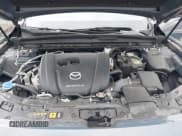 ✅ 2023 Mazda CX-50 S Premium Plus • VIN: 7MMVABEM6PN105424 • Lot: 42148825. Wystawiony na IAAI z przebiegiem 40 434 mil. Bezpłatny archiwum sprzedaży aukcyjnych z USA i szczegółowy raport historii pojazdu na DreamBid. Zdjęcie 10.