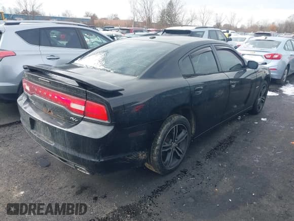 ✅ 2014 Dodge Charger RT Max • VIN: 2C3CDXDT0EH281304 • Lot: 43651055. Listed on IAAI with 147,287 mi. Free auction sales archive from the USA and detailed vehicle history report at DreamBid. Image 4.