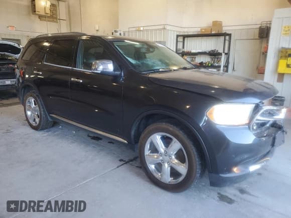 ✅ 2013 Dodge Durango Citadel • VIN: 1C4RDJEG0DC674967 • Lot: 90258325. Listed on Copart with 176,266 mi. Free auction sales archive from the USA and detailed vehicle history report at DreamBid. Image 4.