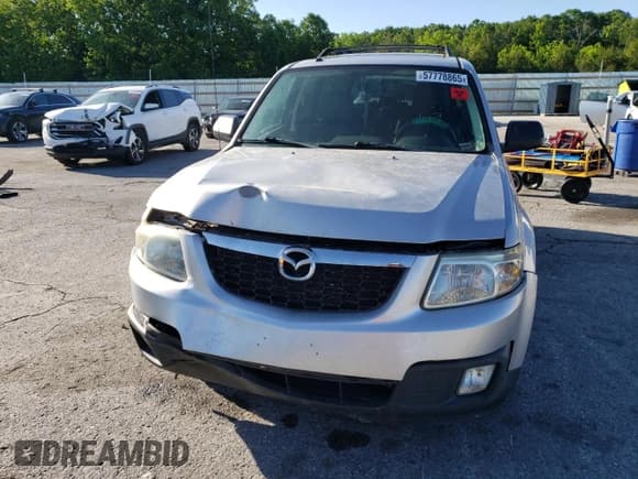 ✅ 2011 Mazda Tribute Grand Touring • VIN: 4F2CY9GG3BKM02499 • Lot: 57778865. Listed on Copart with 148,502 mi. Free auction sales archive from the USA and detailed vehicle history report at DreamBid. Image 5.