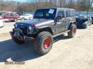 ✅ 2018 Jeep Wrangler Unlimited Rubicon Recon • VIN: 1C4BJWFG3JL887459 • Lot: 41687698. Listed on IAAI with 97,031 mi. Free auction sales archive from the USA and detailed vehicle history report at DreamBid. Image 2.