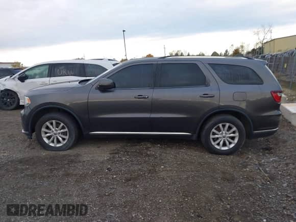 2014 Dodge Durango SXT z VIN 1C4RDJAG5EC278525, wystawiony jako IAAI lot #43579045 z przebiegiem 181 939 mil mil oraz . Historia ofert i sprzedaży dostępna na DreamBid. Obrazek 14.